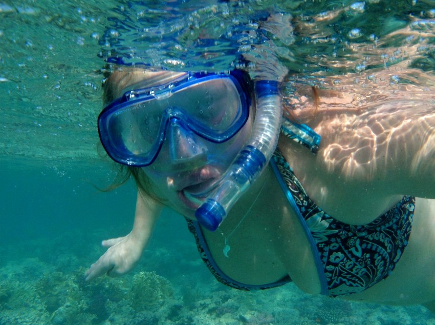 woman snorkeling crab island snorkeling